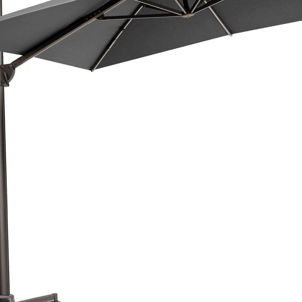 11' Gray Polyester Round Tilt Cantilever Patio Umbrella with Stand. Outdoor umbrella isolated on a plain white background, in a gray fabric finish.