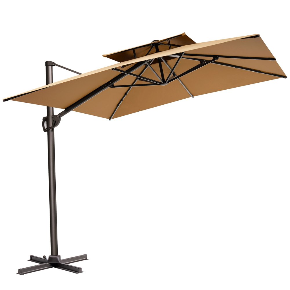 Tan cantilever patio umbrella with a two-tier canopy and a dark metal stand on a white background.