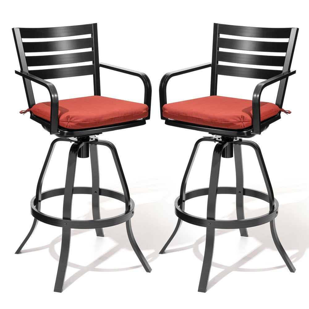 Two black aluminum swivel outdoor bar height chairs with red cushions on a white background.