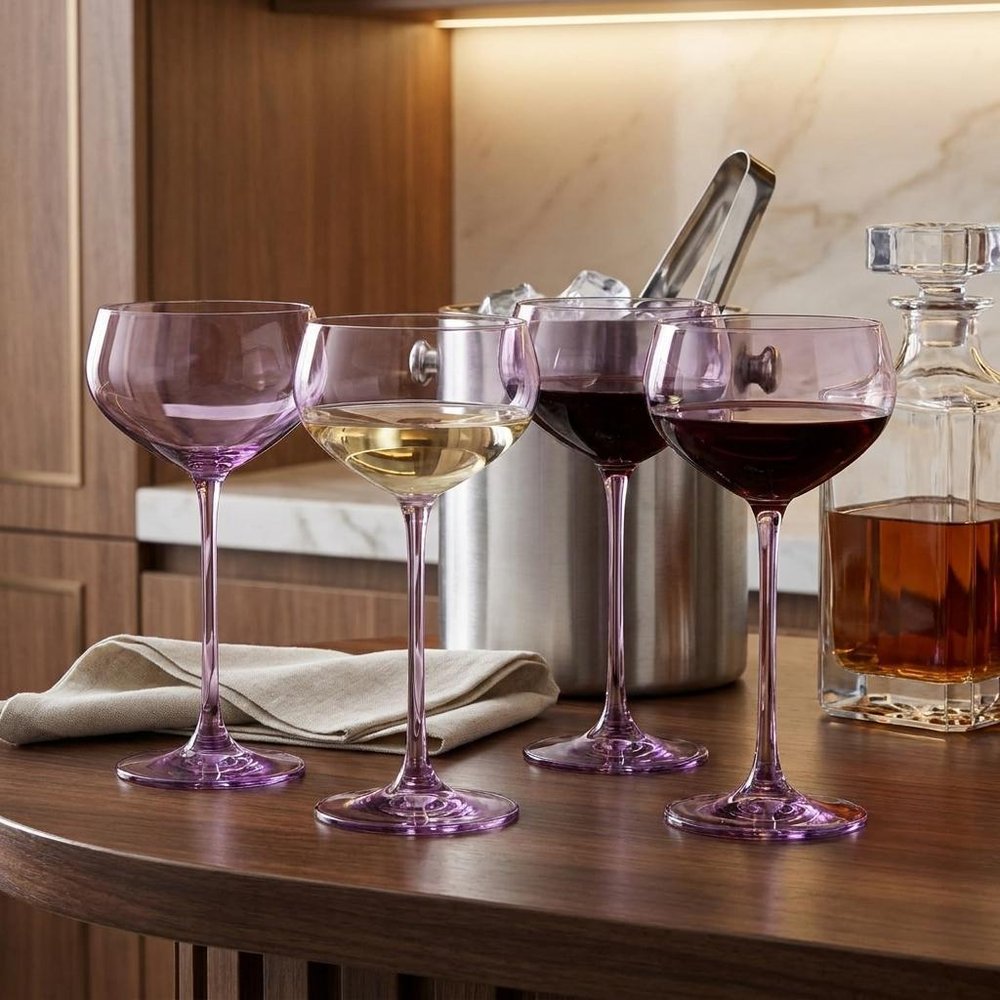 Set of Four Purple Crystal Shallow Bowl Stemmed Coupe in a home interior