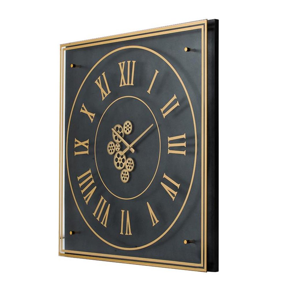 35" Black And Gold Glass And Metal Exposed Gear Square Wall Clock. Wall clock isolated on a plain white background, in a gold glass finish.