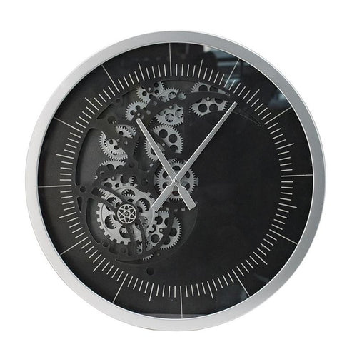 Black and silver analog wall clock with exposed gears, silver metal frame, and white hour markers on a black face.