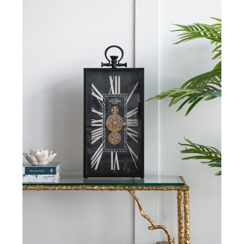 10" Black and Gold Metal and Glass Analog Vintage Style Crackle Wall Clock. Wall clock isolated on a plain white background, showing a glass surface.
