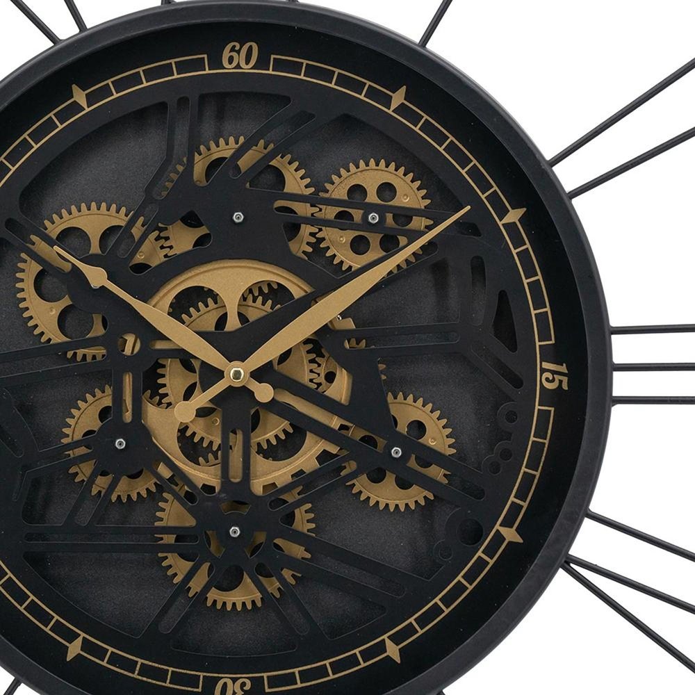 32" Circle Black and Gold Metal and Glass Analog Exposed Gear Wall Clock photographed against a dark studio background in black.