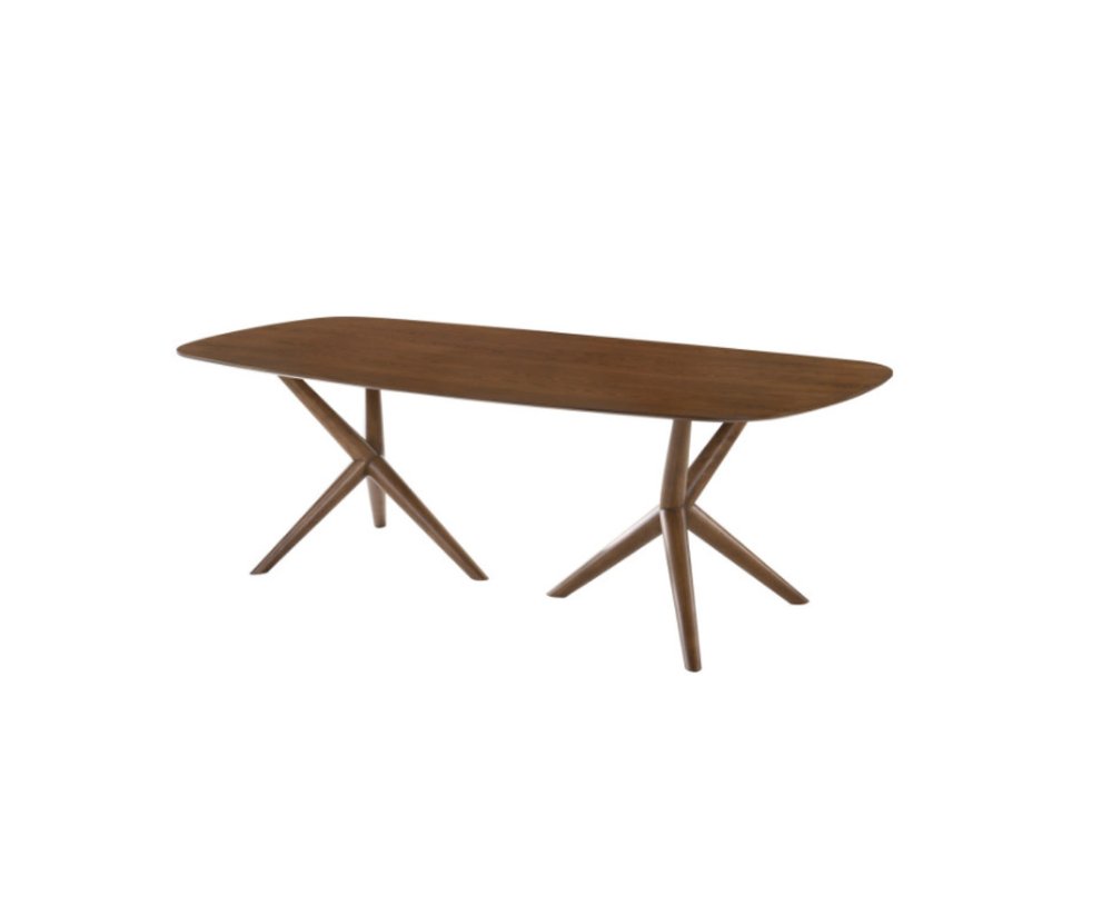 A brown solid manufactured wood dining table with a unique X-shaped leg design on a white background.