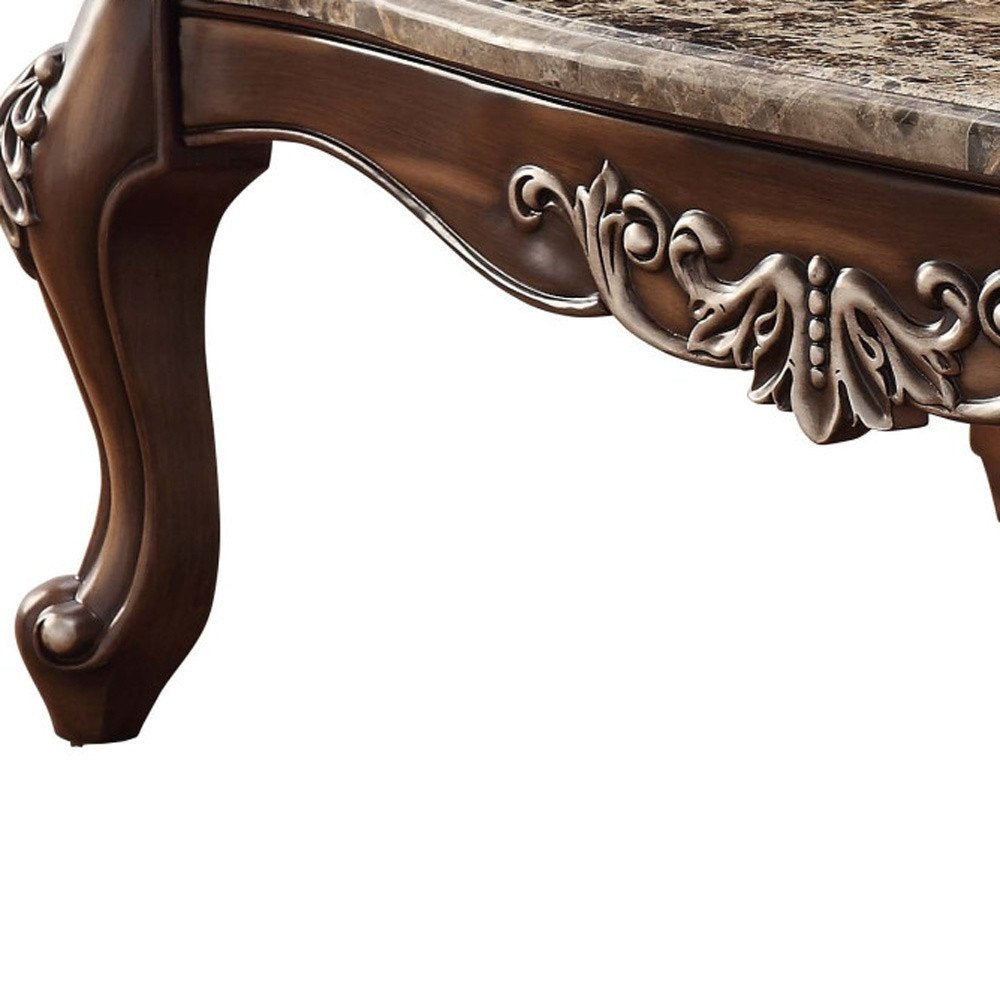 57" Brown and Oak Faux Marble And Wood Coffee Table. Coffee table isolated on a plain white background, showing a brown wood surface.