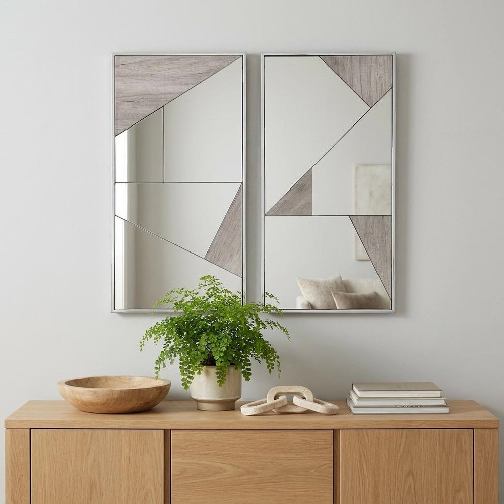 Set of Two Natural Metal Framed Accent Mirror in a home interior