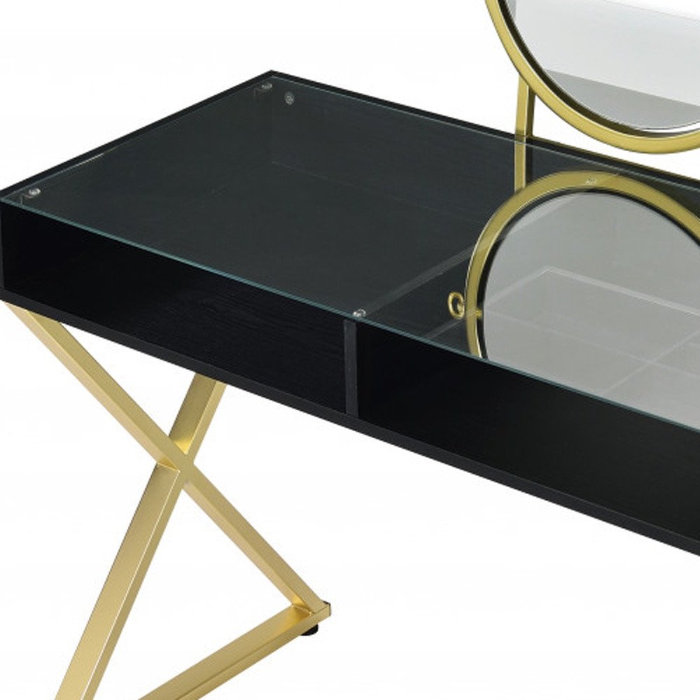 42" Black And Gold Glass and Wood Mirrored Vanity Table. Vanity table isolated on a plain white background, finished in black glass.