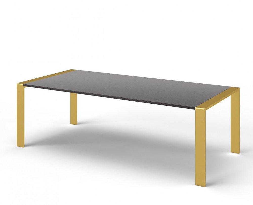 A gray stainless steel dining table with brass legs on a white background.