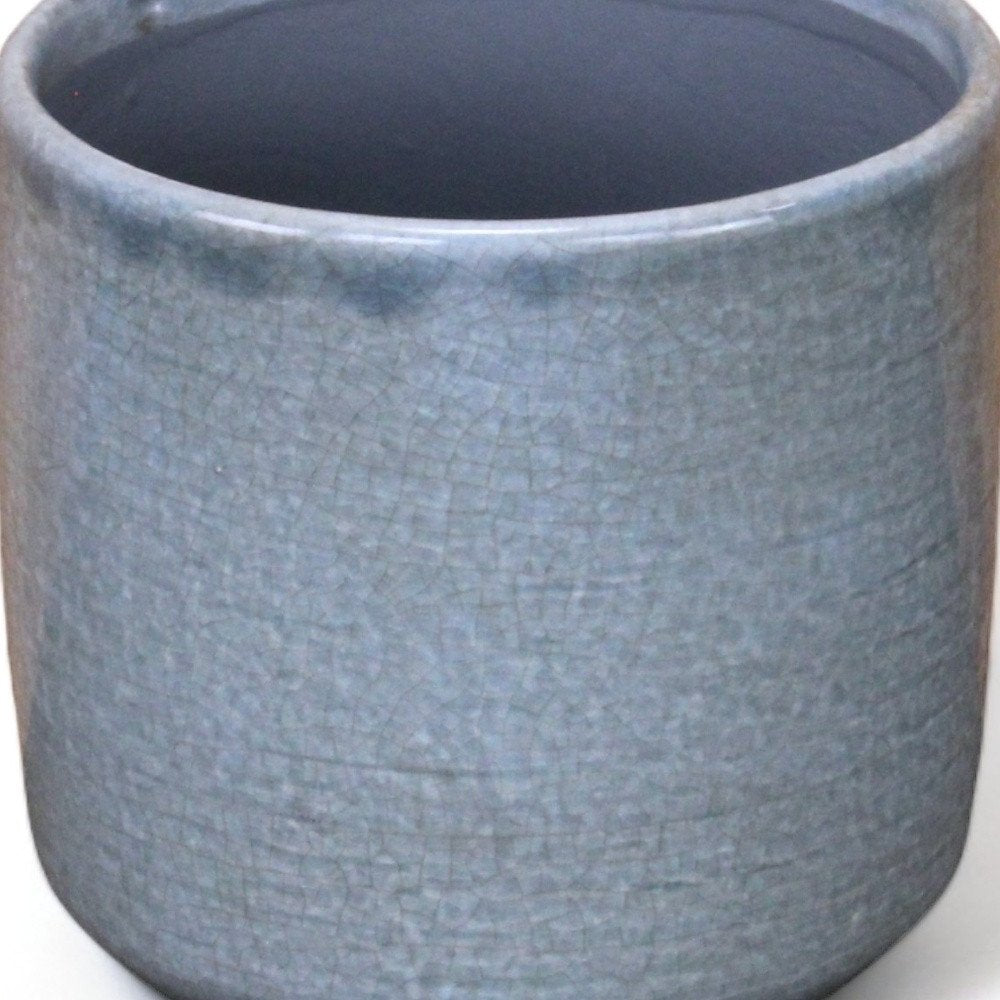 Gray Ceramic 44 Ounce Crackle Mosaic Round Distressed Pot Planter in a home interior