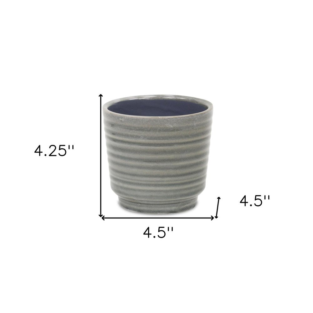 Gray Ceramic 23 Ounce Striped Round Distressed Pot Planter on a white background