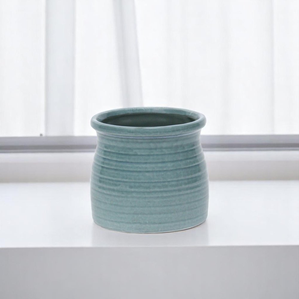 Celadon Ceramic 25 Ounce Striped Round Distressed Pot Planter on a white background