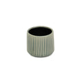 Green Ceramic 25 Ounce Striped Round Distressed Pot Planter on a white background