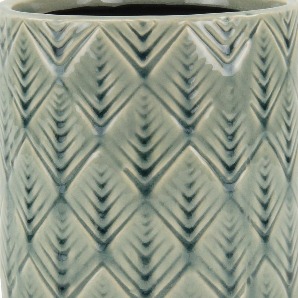 Close-up of 6" Green Geometric Ceramic Indoor Outdoor Round Pot Planter showing the green ceramic texture.