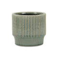 Green Ceramic 41 Ounce Striped Round Distressed Pot Planter on a white background