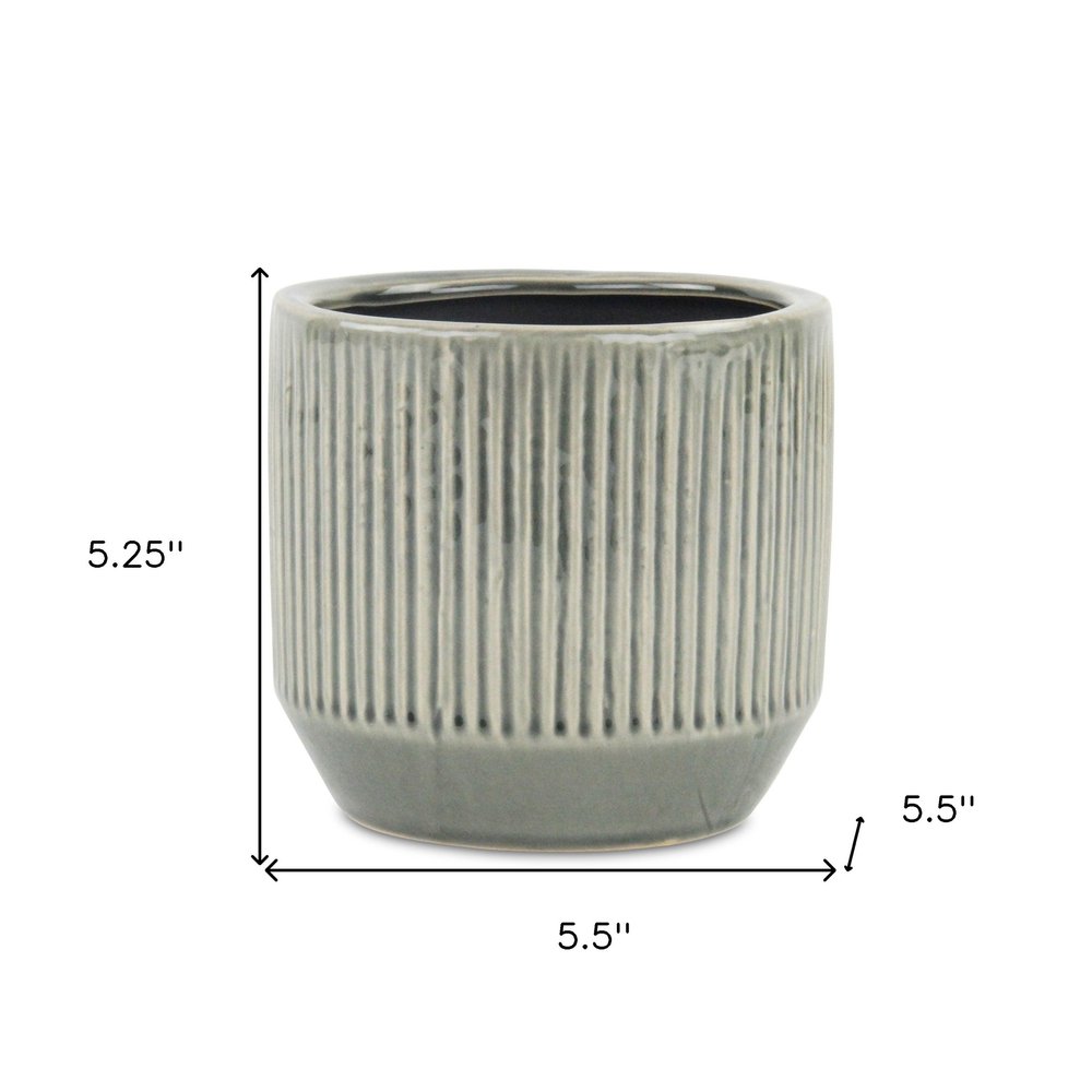 6" Gray Striped Ceramic Indoor Outdoor Round Pot Planter. Outdoor planter isolated on a plain white background, finished in gray ceramic.