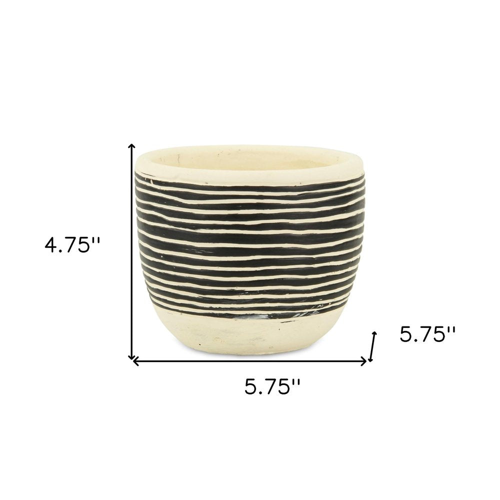 Black And White Ceramic 39 Ounce Striped Round Distressed Pot Planter on a white background
