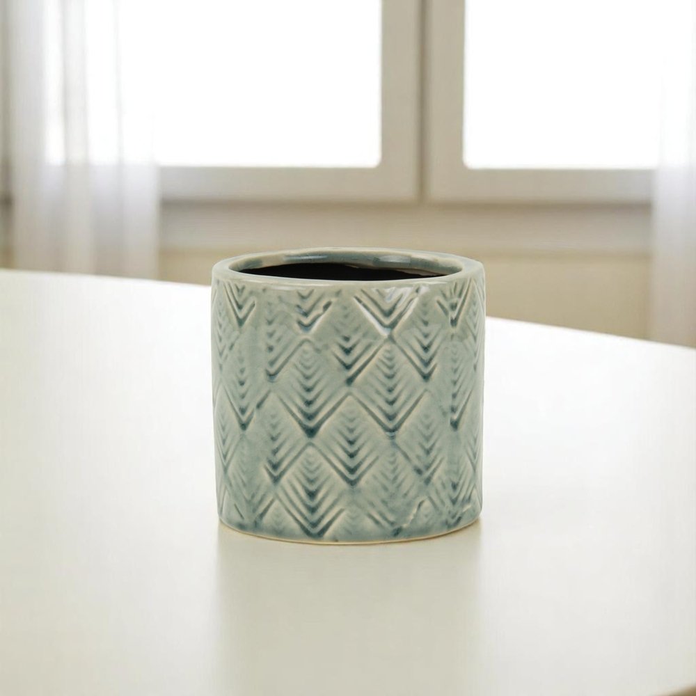 Green Ceramic 16 Ounce Geometric Round Distressed Pot Planter on a white background