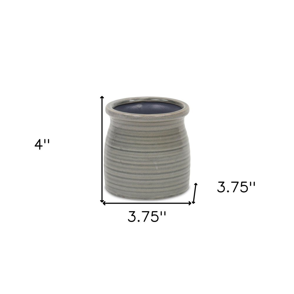 Gray Ceramic 15 Ounce Striped Round Distressed Pot Planter on a white background