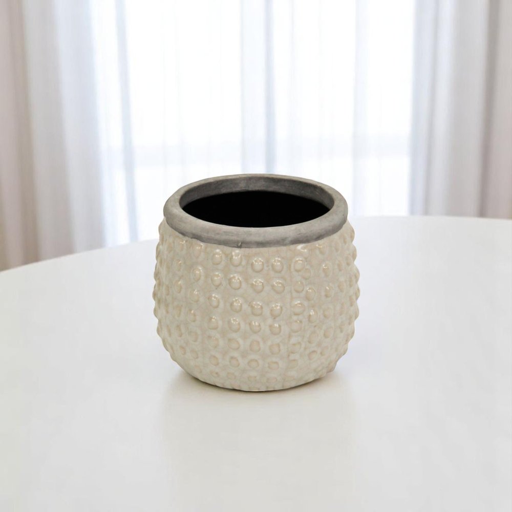 Beige And Gray Ceramic 12 Ounce Dotted Round Distressed Pot Planter on a white background