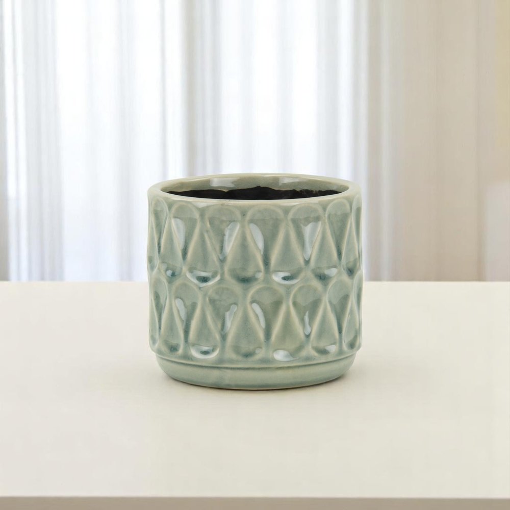 Green Ceramic 10 Ounce Geometric Round Distressed Pot Planter on a white background