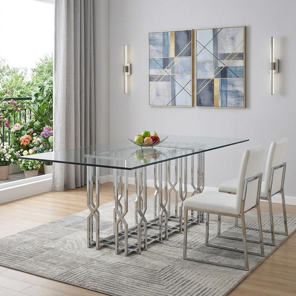 87" Clear And Silver Glass And Stainless Steel Pedestal Base Dining Table in a home interior