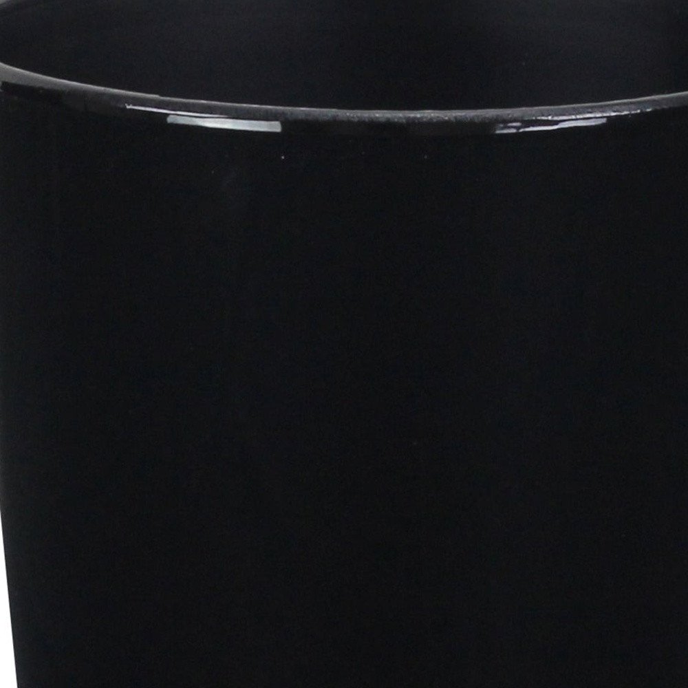5" Black Recycled Plastic Indoor Outdoor Round Pot Planter photographed against a dark studio background in black.