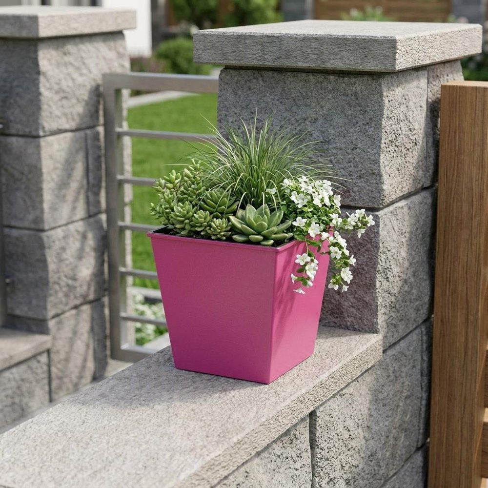 5" Hot Pink Recycled Plastic Indoor Outdoor Square Pot Planter - 5" H x 5.25" W x 5.25" D shown outdoors on a patio with greenery.