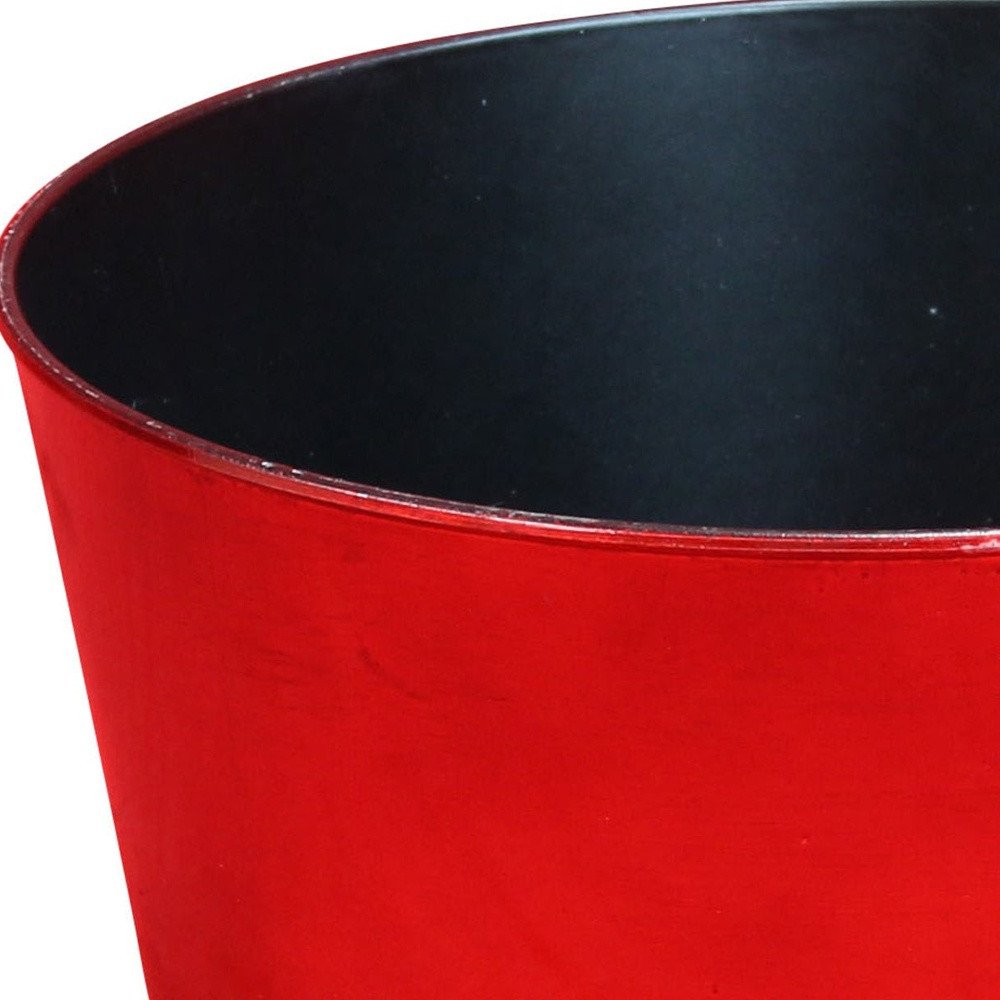 Cropped view of 12" Red Recycled Plastic Indoor Outdoor Round Pot Planter - SKU 488307 focusing on the red plastic surface.