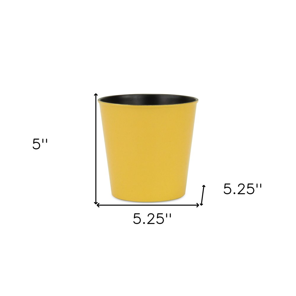 5" Yellow Recycled Plastic Indoor Outdoor Round Pot Planter. Outdoor planter isolated on a plain white background, showing a yellow plastic surface.