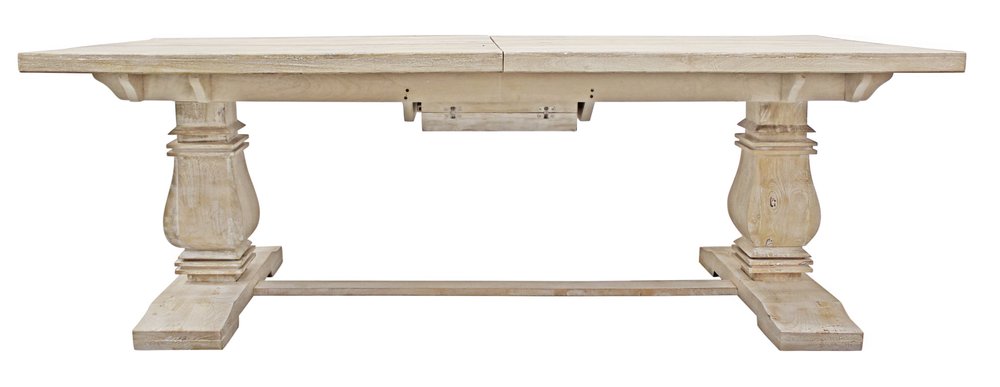 Light brown solid wood rectangular dining table with a butterfly leaf extension and pedestal legs on a white background.