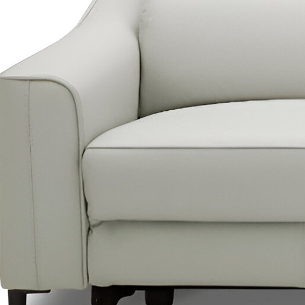 74" Gray Leather Reclining Sofa With Black Legs close-up detail
