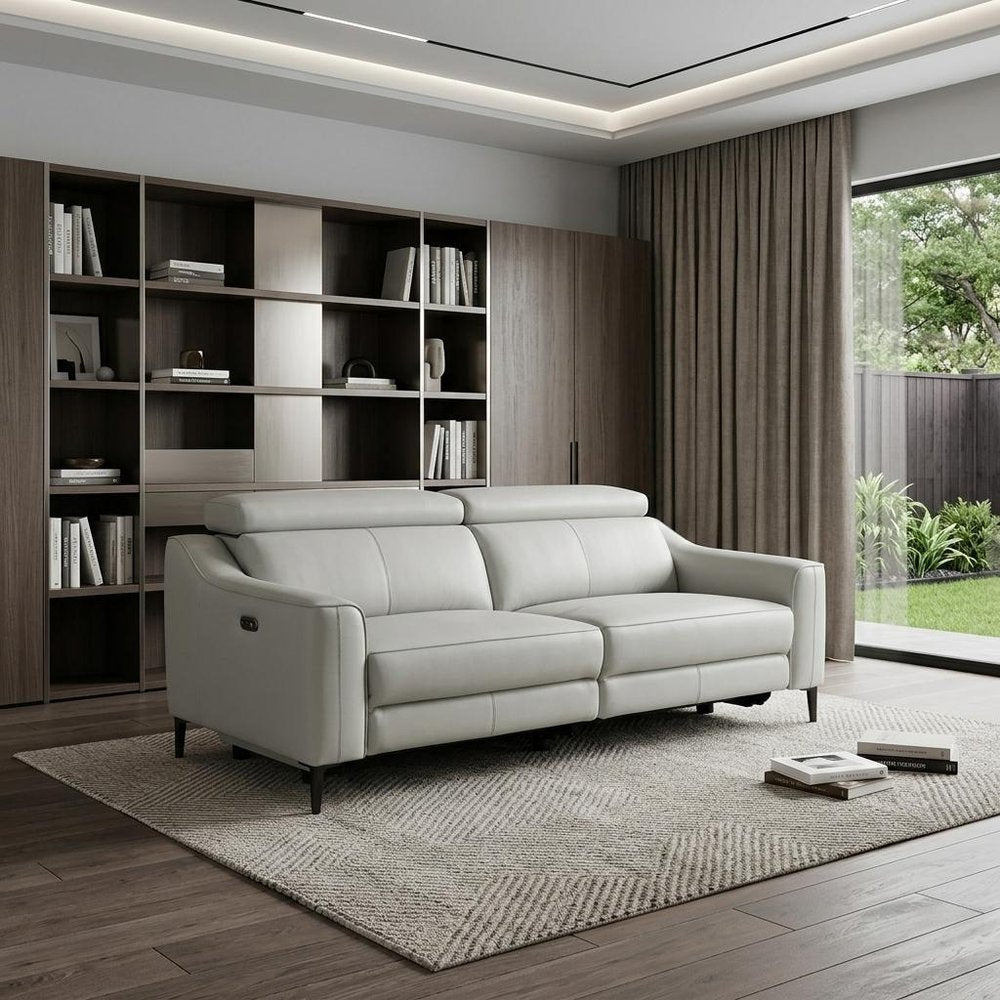 74" Gray Leather Reclining Sofa With Black Legs in a home interior
