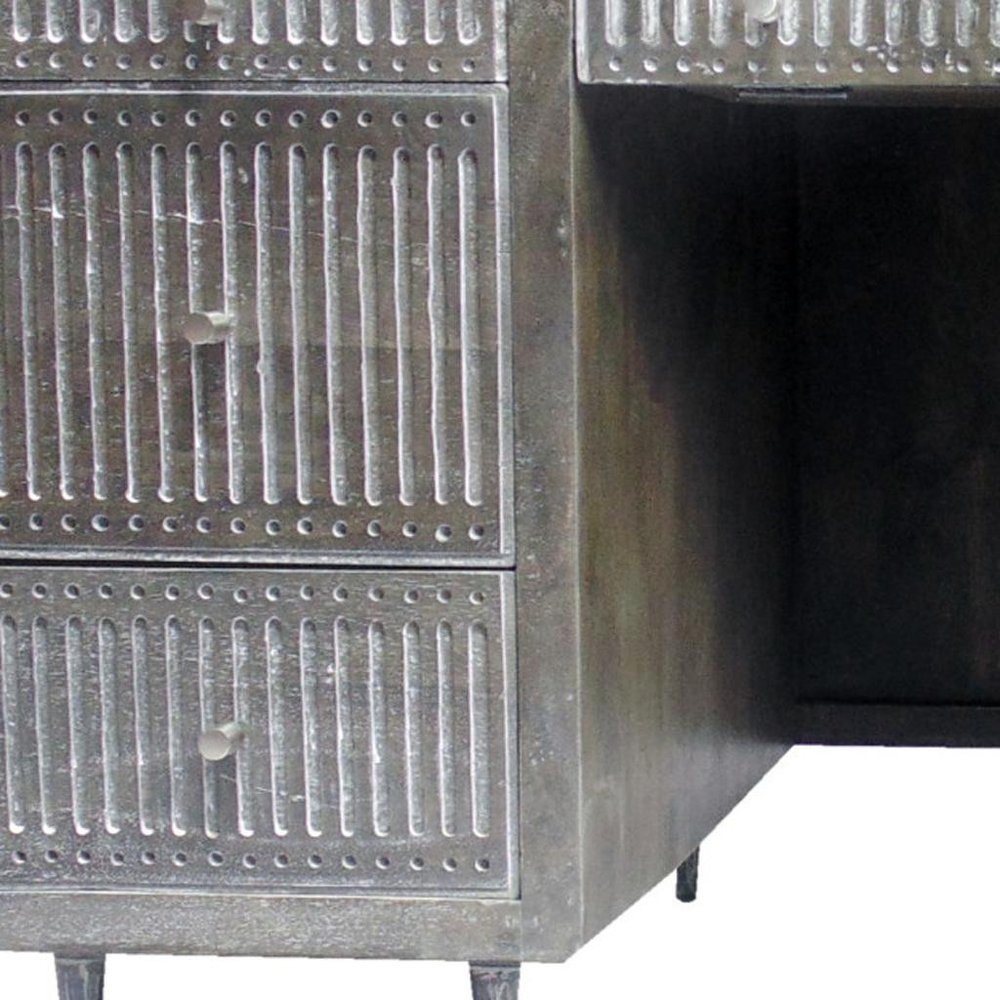 Cropped view of 64" Brown and Silver Solid Wood Executive Desk With Five Drawers focusing on the silver wood surface.