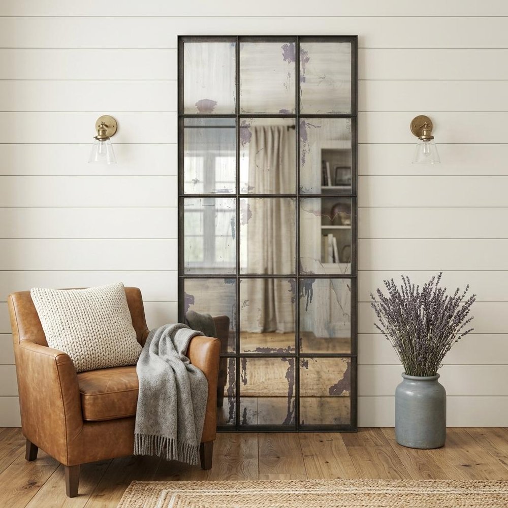 72" Black Metal Framed Full Length Antiqued Glass Hanging Mirror in a home interior