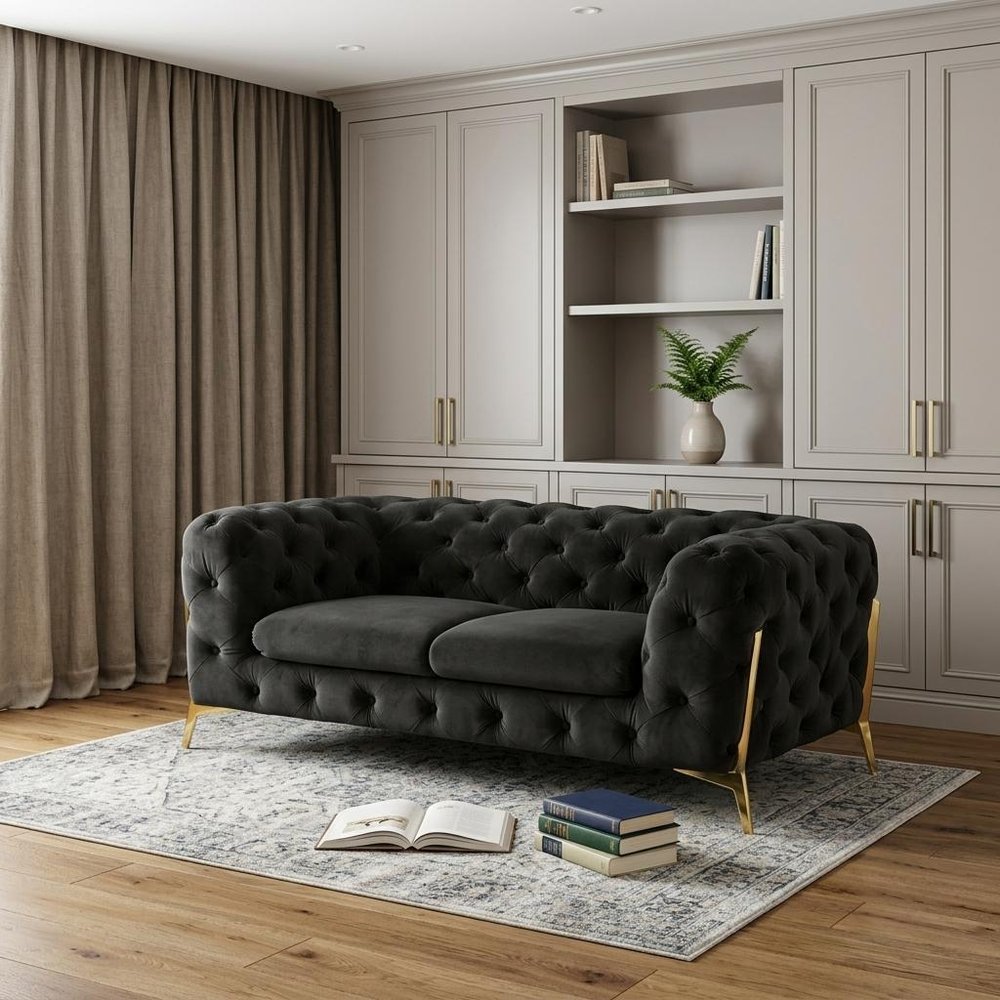 74" Dark Gray And Gold Velour Chesterfield Loveseat in a home interior