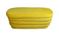 44" Yellow Velvet Tufted Oval Ottoman. Ottoman isolated on a plain white background, finished in yellow velvet.
