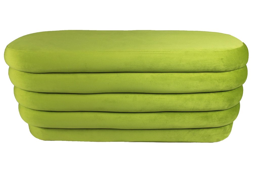 44" Green Velvet Tufted Oval Ottoman. Ottoman isolated on a plain white background, finished in green velvet.