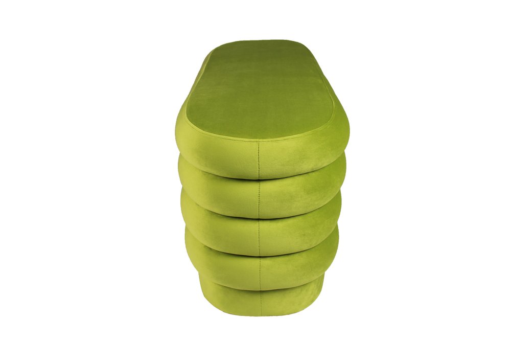 44" Green Velvet Tufted Oval Ottoman. Ottoman isolated on a plain white background, in a green velvet finish.