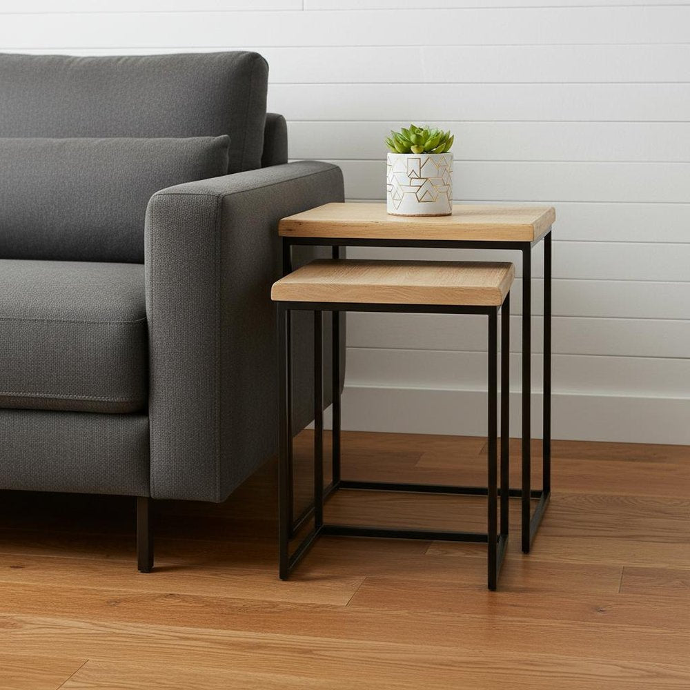 Set of Two 25" Black And Brown Solid Wood Nested Tables - 24.75" H x 19.75" W x 13.75" D in a home interior