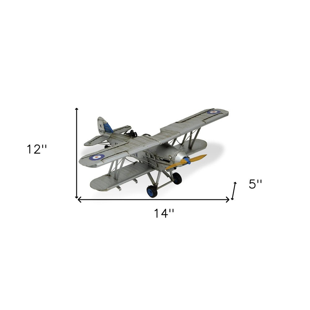 5" Blue and Gray Metal Hand Painted Model Airplane Tabletop Sculpture. Sculpture isolated on a plain white background, finished in gray metal.