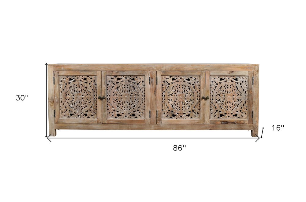 86" Natural Carved Floral Distressed Solid Wood Enclosed Storage TV Stand on a white background