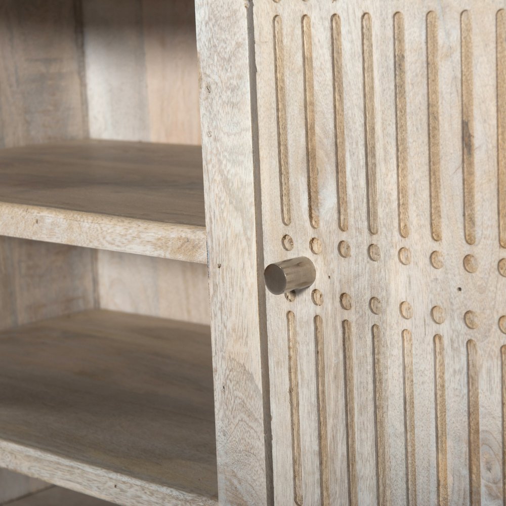 Detail view of 60" Ivory Carved Geometric Distressed Solid Wood Enclosed and Open Storage TV Stand, filling the frame with the ivory wood texture.