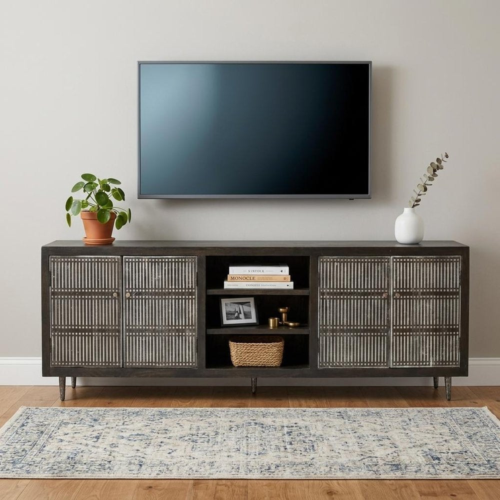 92" Dark Brown Carved Geometric Distressed Solid Wood Enclosed and Open Storage TV Stand in a home interior