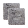 Set Of Two 17" X 17" Grey Wool Chair Pads on a white background