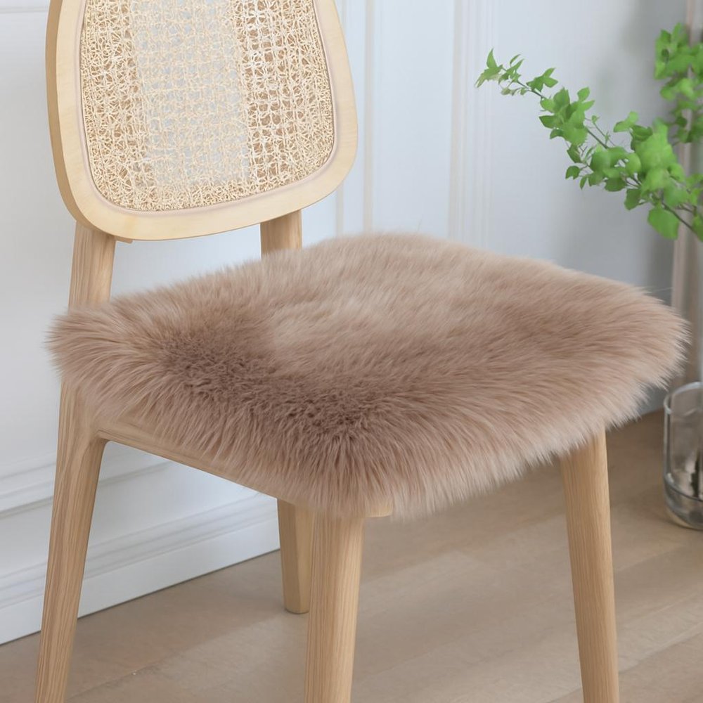 Set Of Two 17" X 17" Taupe Wool Solid Color Chair Pads in a home interior