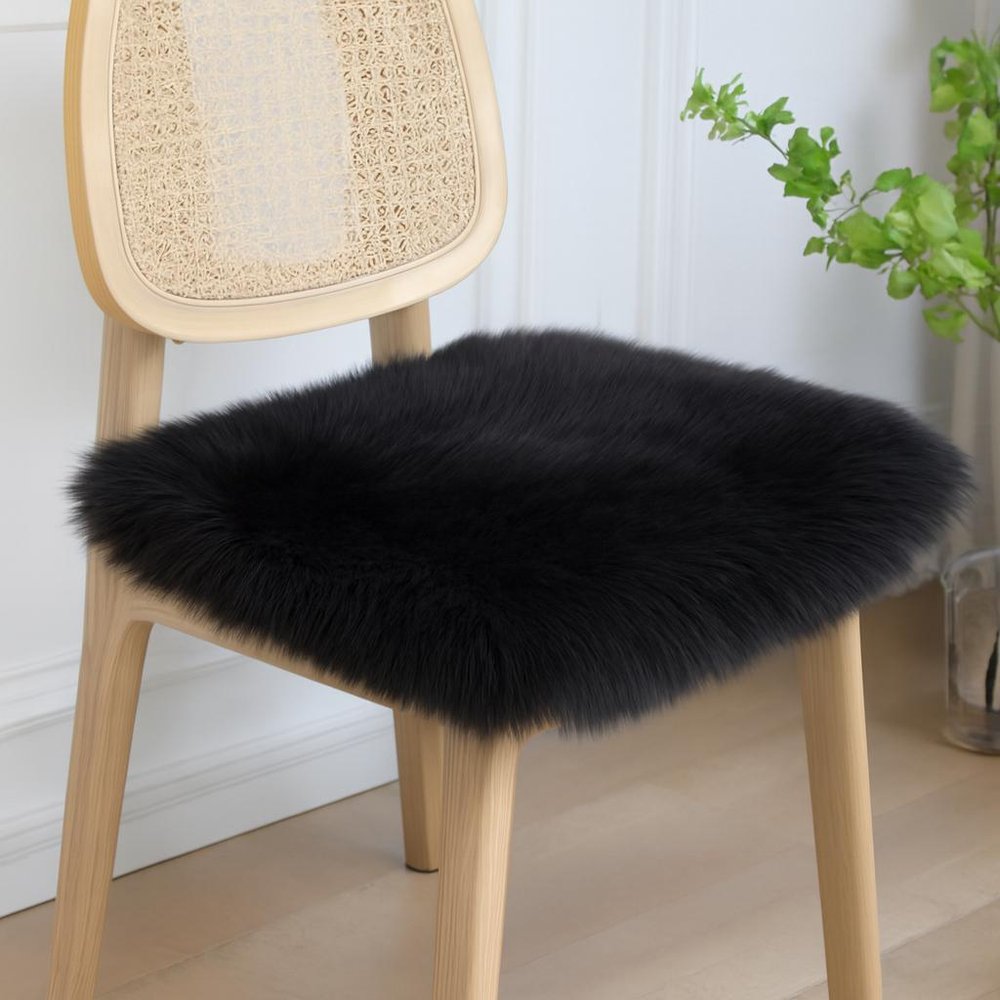 Set Of Two 17" X 17" Black Wool Chair Pads in a home interior