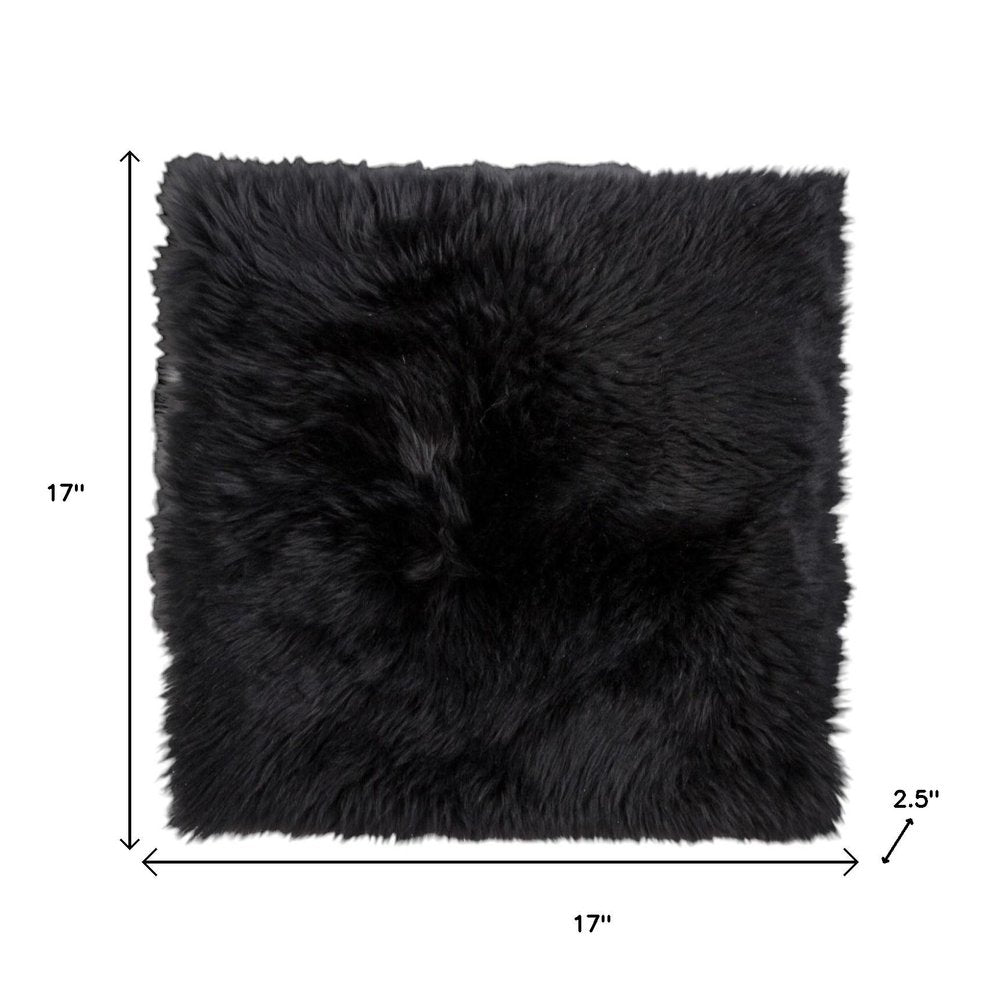 Set Of Two 17" X 17" Black Wool Chair Pads on a white background