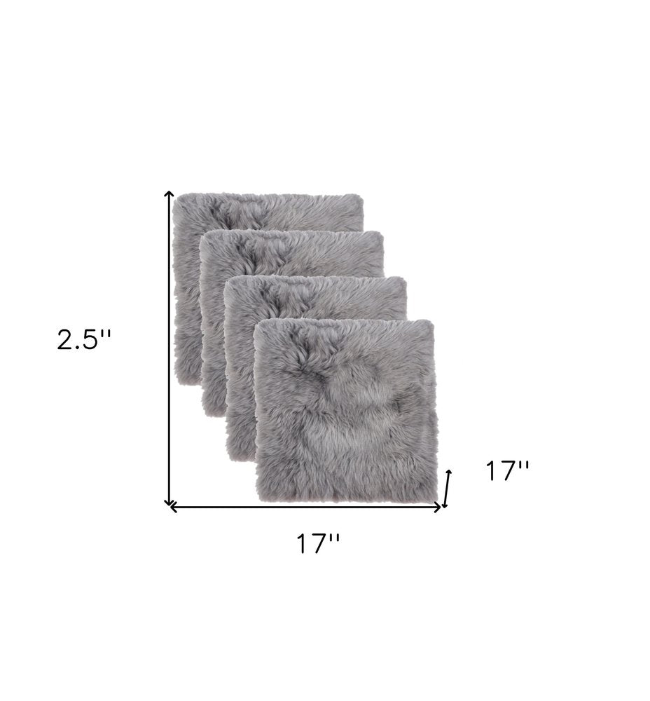 Set Of Four 17" X 17" Grey Wool Chair Pads on a white background