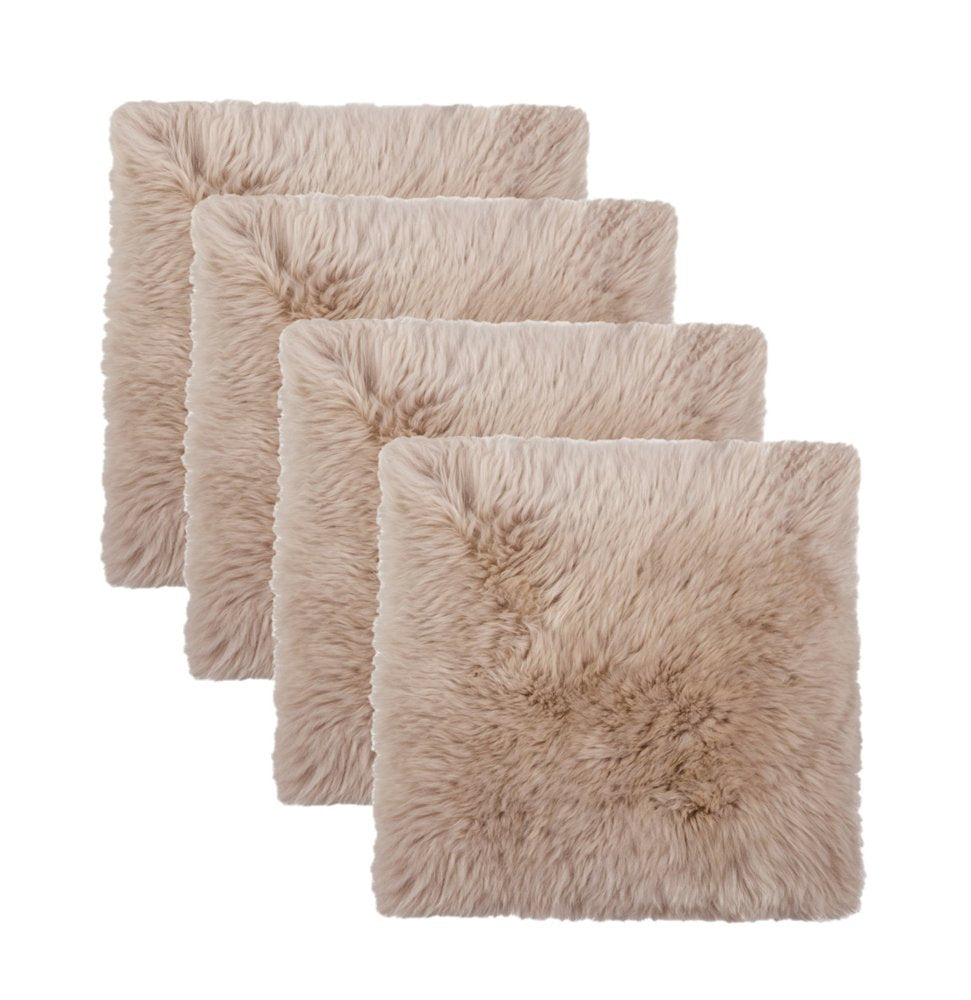 Four taupe wool chair pads arranged in a staggered formation against a white background.